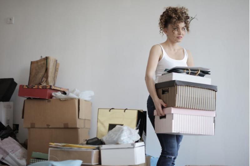 A person packing for a move