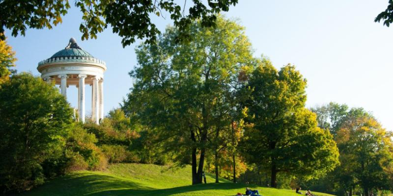 photo of the English Garden, a perfect spot for a romantic date in Munich